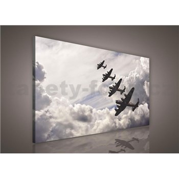 Obraz na stenu lietadla v oblakoch 75 x 100 cm